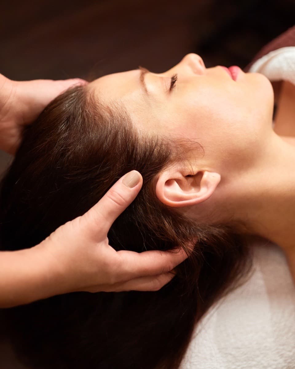 Hands-on sculpting facial massage at THE ONE Clinic in Austin