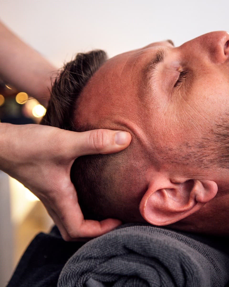 Scalp and head massage during a Korean head spa session at THE ONE Clinic in Austin